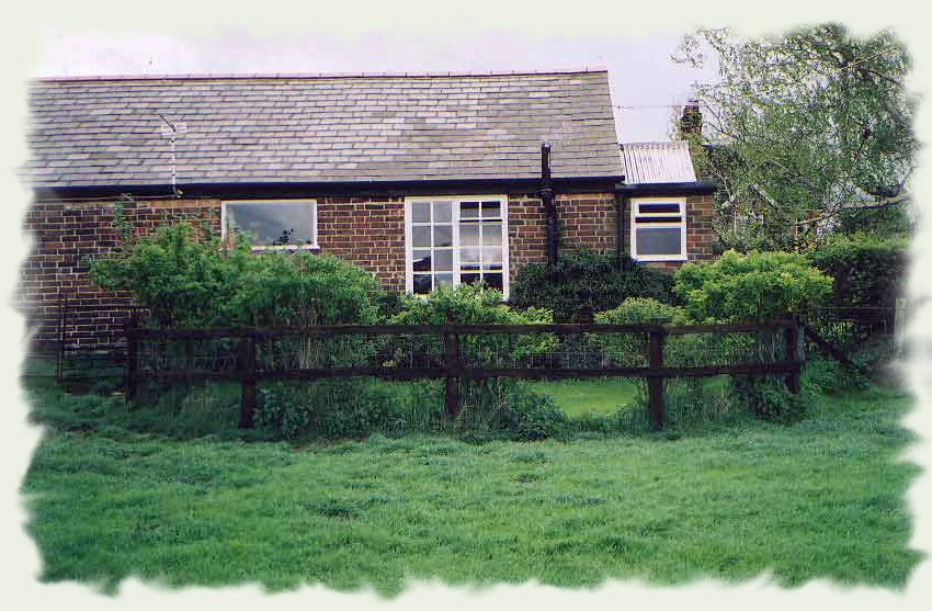 Chalet garden next to sheep field